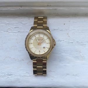 Michael Kors Women’s gold fashion watch